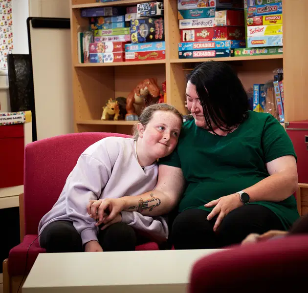 Mum and daughter on a couch