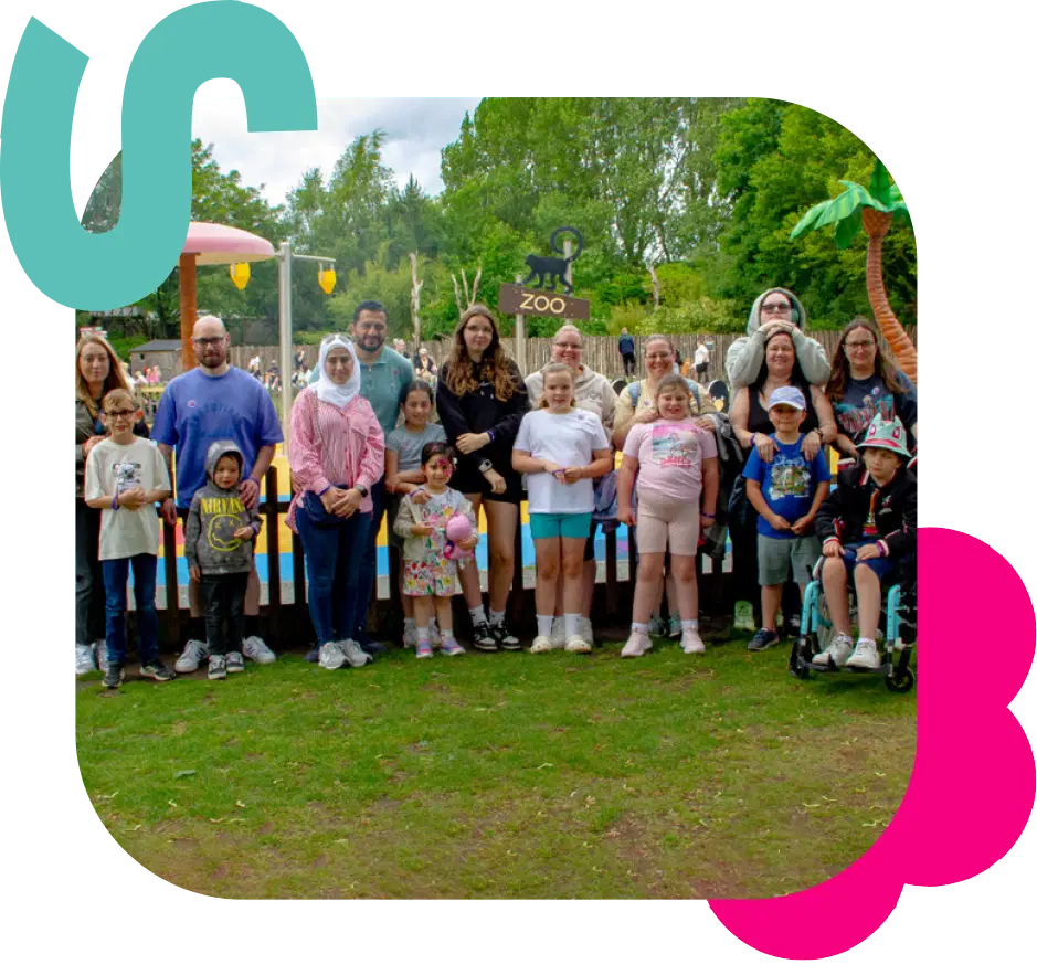 A group of children an carers at a zoo